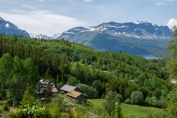 Landscape photo of farm in the mountains