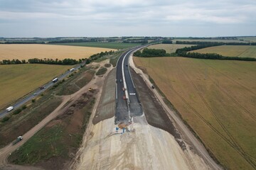 D7 motorway is a highway northwest from Prague to Chomutov and the German border,building of new highway by Louny city,speed road construction work with bridges and modern infrastructure,Czech-Europe