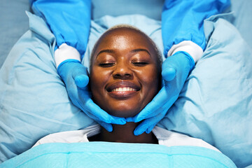 Beauty, smile and hands of surgeon on black woman face in clinic for plastic surgery, skincare or...
