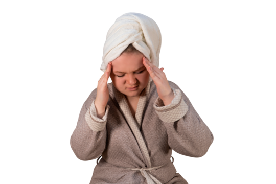 A girl in a bathrobe put her head in her hands on a transparent background. Headache. The concept of medicine, pharmacy, healthcare and home treatment