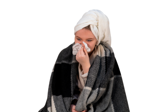 A girl with symptoms of a cold blows her nose into a paper handkerchief on a transparent background. Concept of medicine, healthcare, pharmacy and home treatment