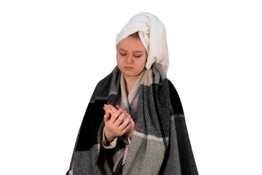 A girl with cold symptoms disinfects her hands on a transparent background. The concept of medicine, healthcare, hygiene and home treatment