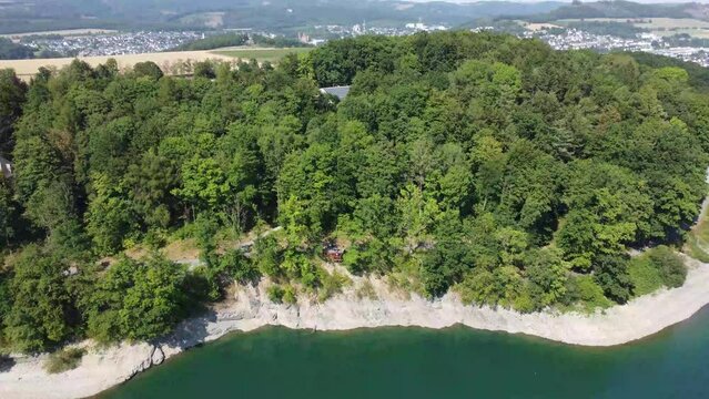 Aerial drone view of lake Hennesee near Meschede in Sauerland, Germany.