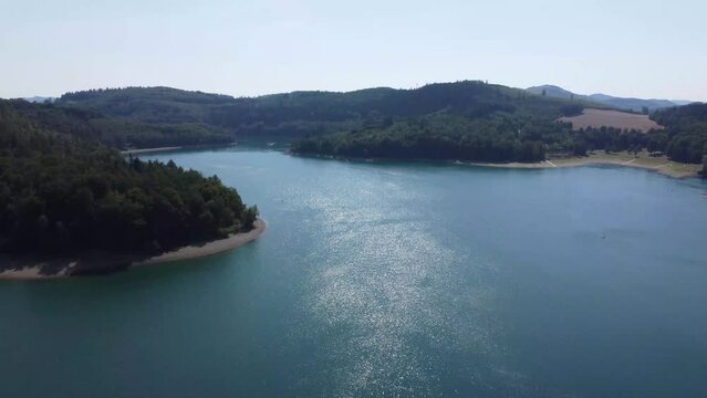Aerial drone view of lake Hennesee near Meschede in Sauerland, Germany.