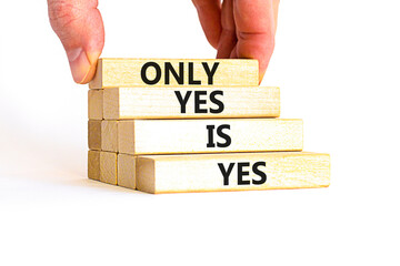 Only yes is yes symbol. Concept words Only yes is yes on wooden blocks on a beautiful white table white background. Businessman hand. Business, psychological only yes is yes concept.