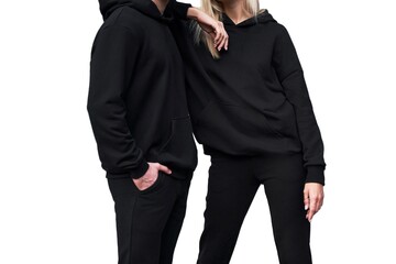 The woman and man wear black hoodies mock-up. Streetwear clothing branding. Logo on shirt template...