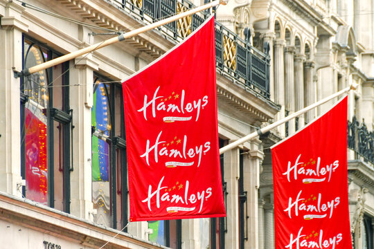 London, England, UK - 28 June 2023: Flags outside the famous toy store Hamleys in Regent Street in central London.