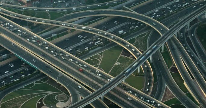 Dubai Highways With Cars And Metro Train