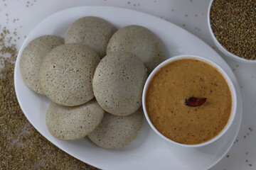 Bajra idly served with spicy coconut condiment. Steamed savory rice cake made by a batter of...