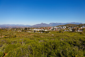 A view from a hill on a sunny day over a section of Worcester, Western Cape, South Africa.