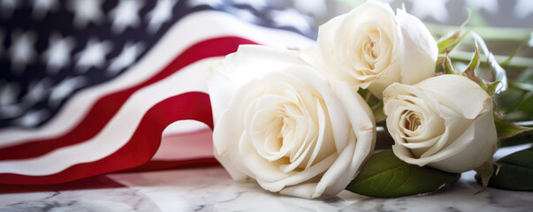 American Flag and White Roses on Marble Table for Memorial Day 