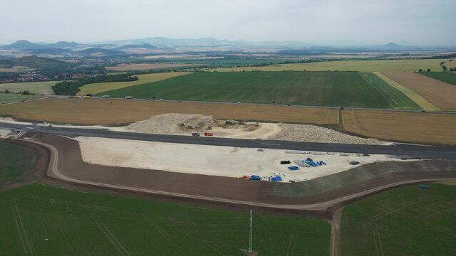  D7 motorway is a highway northwest from Prague to Chomutov and the German border,building of new highway by Louny city,speed road construction work with bridges and modern infrastructure,Czech-Europe