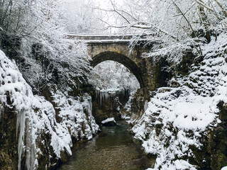 Bridge over the "Taugl" Creek during winter in the region of Salzburg, Austria