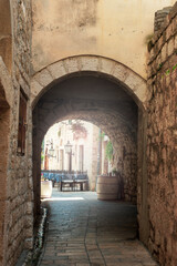Ancient arch in old town of Rab, Croatia