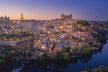 Fototapeta na wymiar Toledo Skyline with Cathedral and Alcazar at sunset - Toledo, Spain
