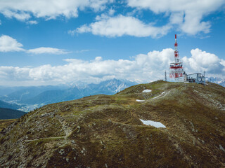 Antenna on top of the Patscherkofel mountain near the city of Innsbruck in the region of Tyrol, Austria, during summer.