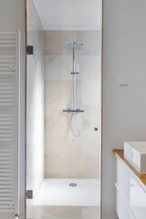 Luxury chrome shower in modern marble bathroom. Square shower head in bathroom with natural light to enjoy relaxing moments