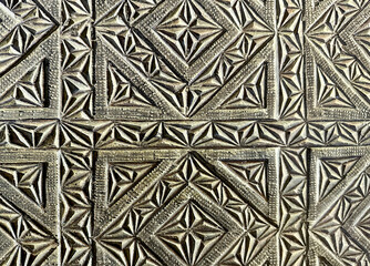 Fine medieval wood carving textured background, fragment of ancient handmade door, pattern with...