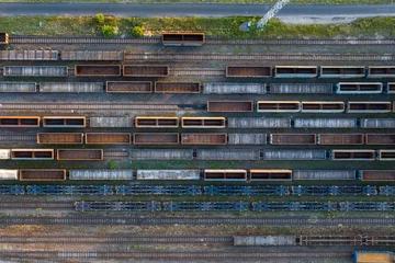 Washable Wallpaper Murals Railway Aerial view of rusty freight trains at the railway station.