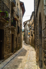 Fototapeta na wymiar Narrow medieval street in the old town. Boltaña, Huesca (Aragón-Spain)