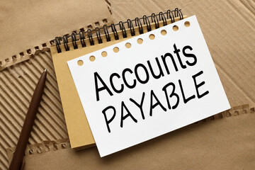 Accounts Payable word per page on a craft notepad