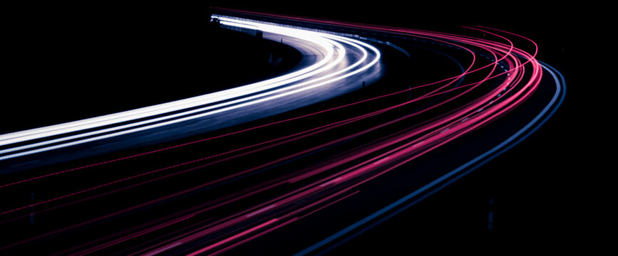 Night road lights. Lights of moving cars at night. long exposure
