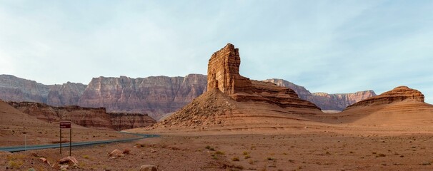 Desert Serenity: Panoramic View of an Empty Road Surrounded by Red Rock Canyon After a Storm, Presented in Captivating 4K Resolution