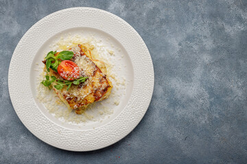 Lasagna with shrimp, mushrooms and parmesan cheese