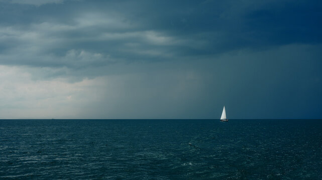 sailing in stormy seas - Powered by Adobe