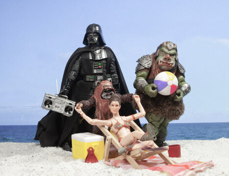 NEW YORK USA, JULY 8 2023: recreation of the 1983 Rolling Stone Star Wars cover with Princess Leia, Darth Vader at the beach - Hasbro action figures
