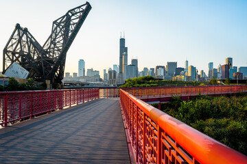 Chicago, Illinois skyline with footbridge at dusk 