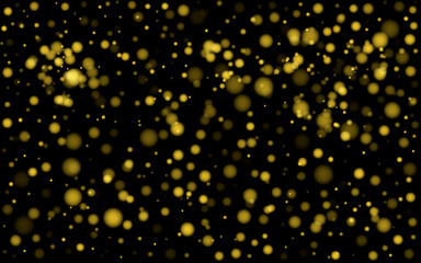 Golden glowing bokeh and sparkle texture on black background. Glowing yellow bokeh circles for your design. Abstract shimmer gold dust. Luxury decoration background