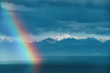 Beautiful rainbow over lake Issyk-Kul, Kyrgyzstan