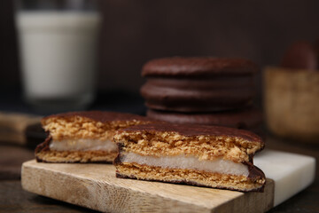 Tasty choco pies on table, closeup. Space for text