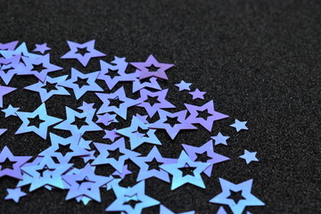 multicolored stars on a black background