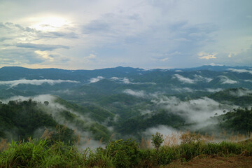 mountains sky white clouds background