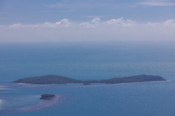 panoramic background of high mountain scenery, overlooking the atmosphere of the sea, trees and...