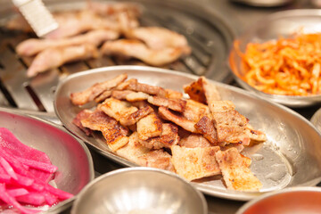 meat pork grilled on stove serve in restaurant. Korean food and BBQ traditional style