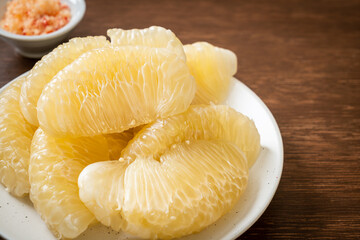 Fresh peeled pomelo, grapefruit or shaddock
