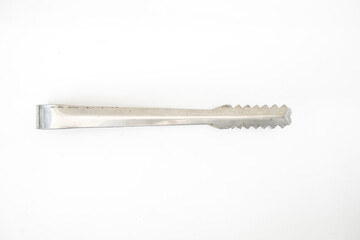 Ice tongs on a white background