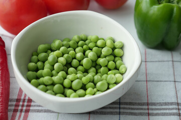 Peas in a Dish on table 
