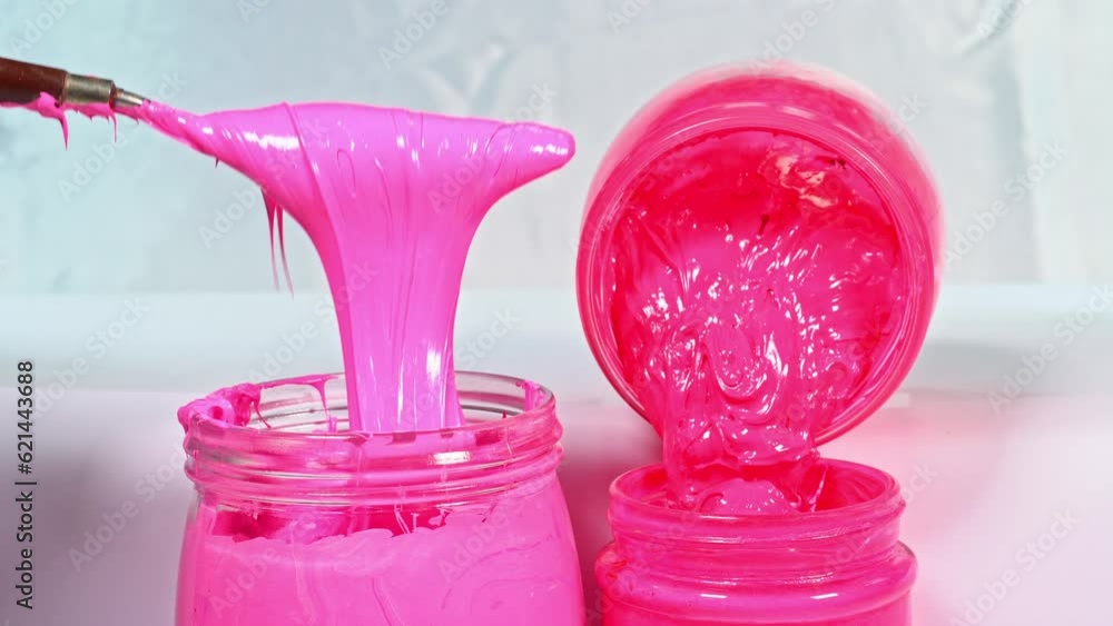 Poster ..use a trowel to soften the pink mix..pink ink drips from the trowel..light pink and dark pink in w