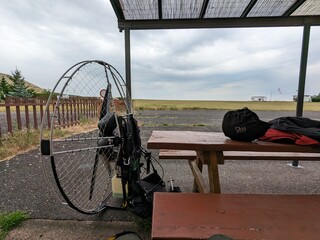 paramotor cooling down after long flight at the field airport Rana in Czechia-powered paragliding...