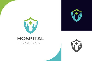 hospital logo design with shield and hand care icon symbol for pharmacy, medicine logo design
