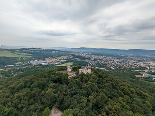 Aerial panorama of Doubravska Hora Castle near Teplice, showcasing its hilltop location, historical significance, and scenic views of the Czech landscape