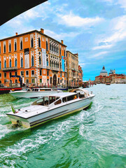 view of the boat and building at Venice, Italy