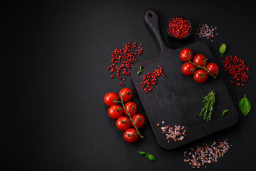 Ingredients for cooking cherry tomatoes, salt, spices and herbs