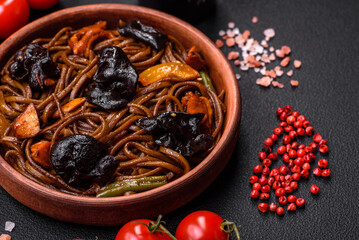 Delicious fresh buckwheat noodles or udon with mushrooms, peppers and other vegetables