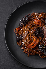 Delicious fresh buckwheat noodles or udon with mushrooms, peppers and other vegetables