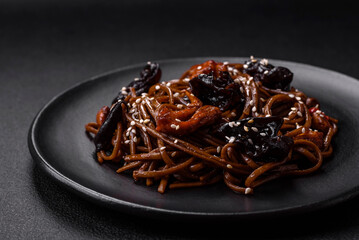 Delicious fresh buckwheat noodles or udon with mushrooms, peppers and other vegetables